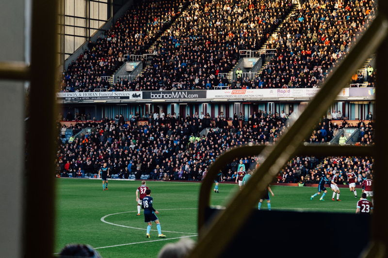 obstructed view of a premier league game from stands