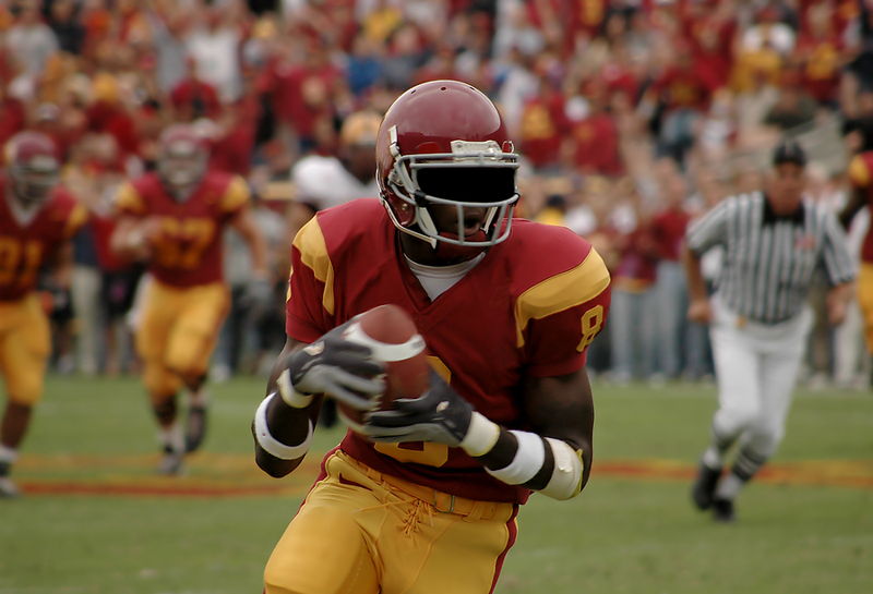 american football nfl player running with the ball fast