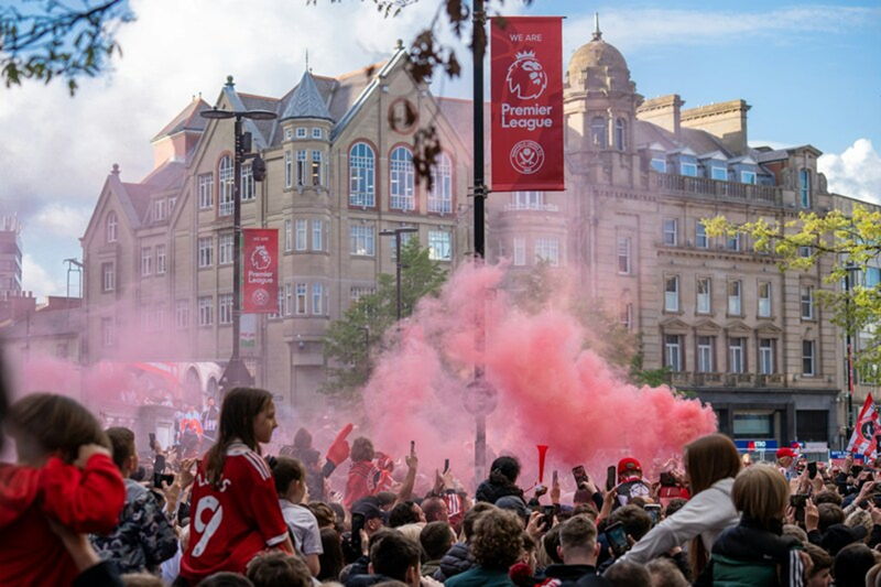 trophy parade huge crowds flare smoke