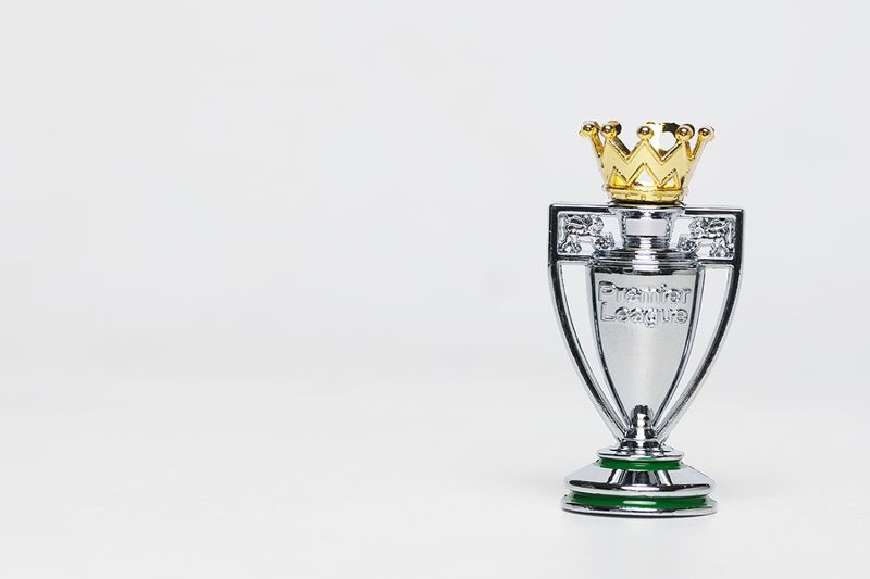 premier league trophy grey background
